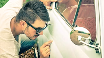 Woman on laptop with MoneySuperMarket logo displayed