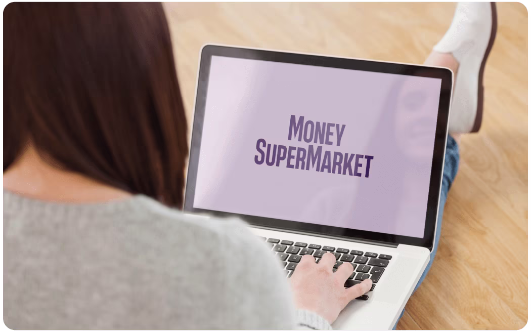 Woman on laptop with MoneySuperMarket logo displayed