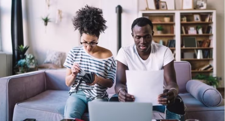 Couple looking over mortgage documents