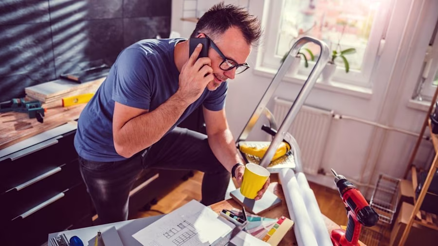 Man doing DIY in his kitchen