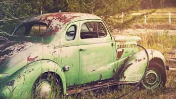 Woman on laptop with MoneySuperMarket logo displayed