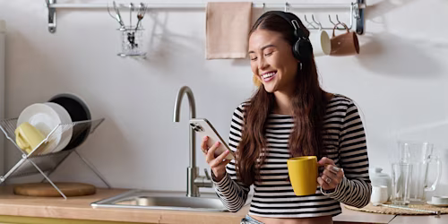 woman on phone relaxed happy