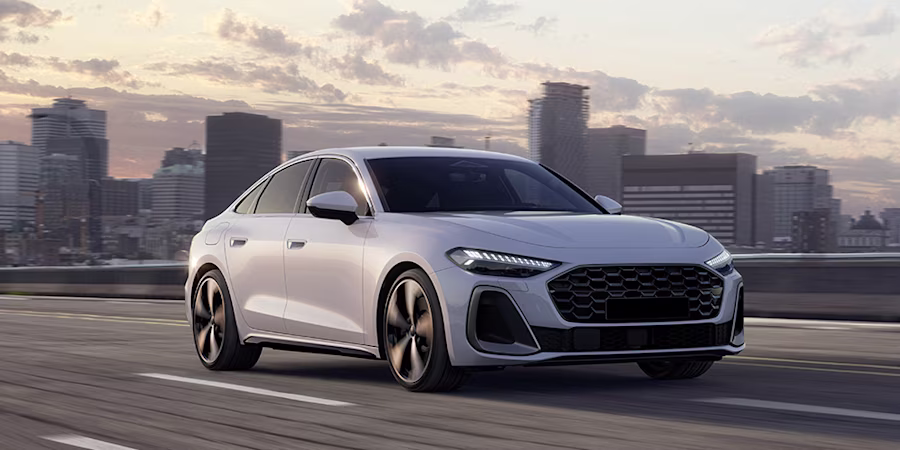 luxury car driving on city road