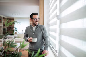 Man looking happy with coffee