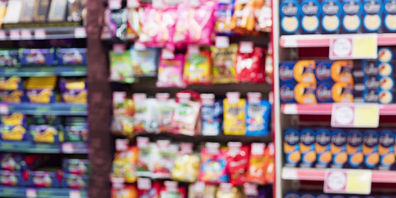 shelves of snacks in supermarket