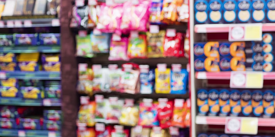 shelves of snacks in supermarket