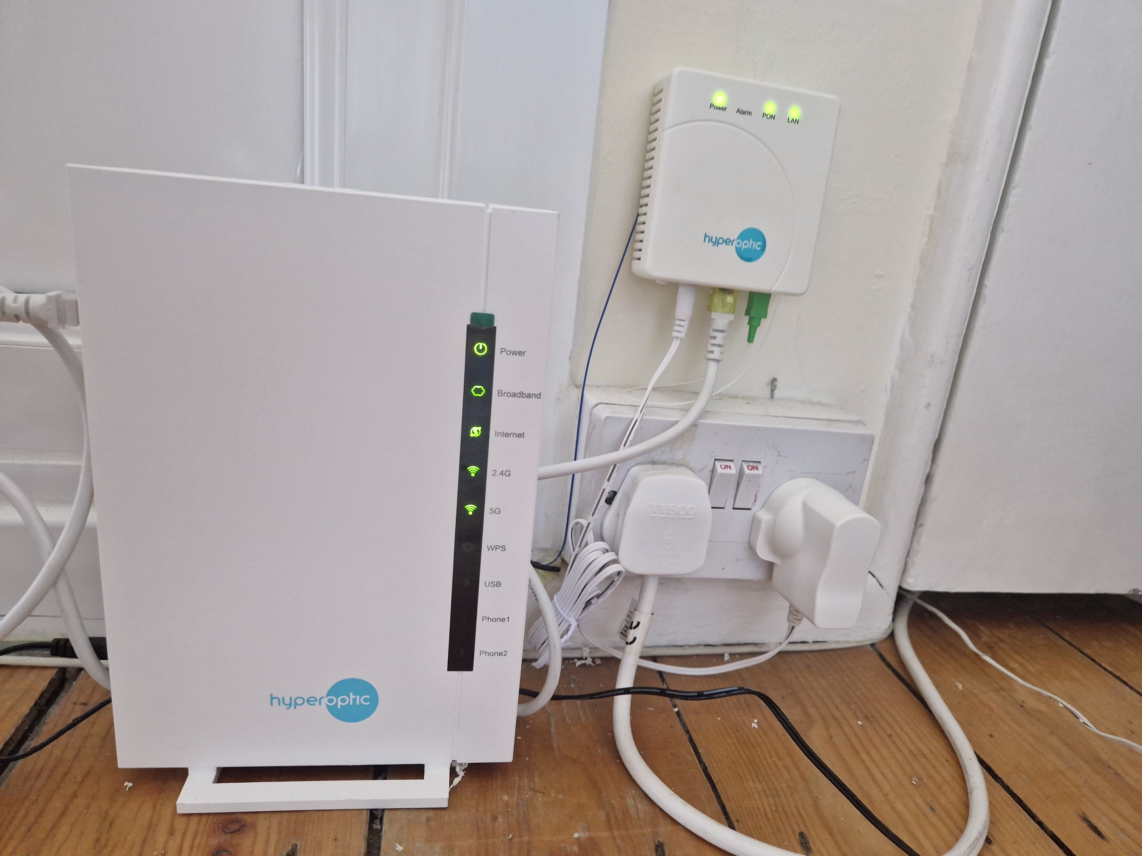 A Hyperoptic router, box, and plug socket