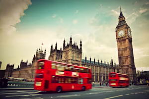 Woman on laptop with MoneySuperMarket logo displayed