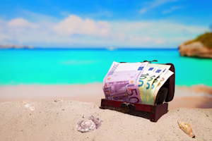 Woman on laptop with MoneySuperMarket logo displayed