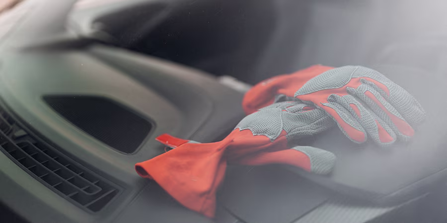 gloves on vehicle dashboard