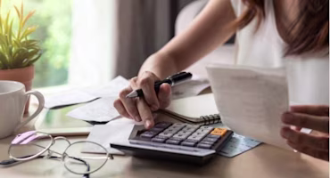 Woman working out payments