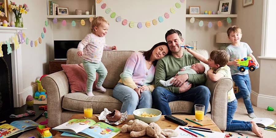 parents at Easter party exhausted while children play