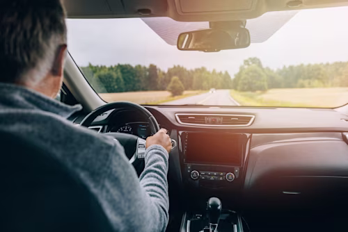 img-man-driving-car-shutterstock 2199667743