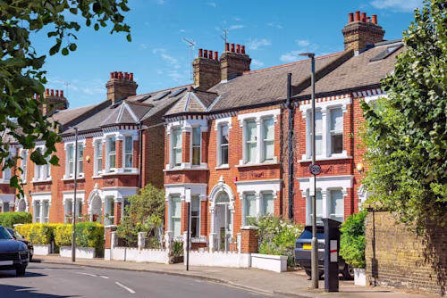 Row of terraced town houses and road