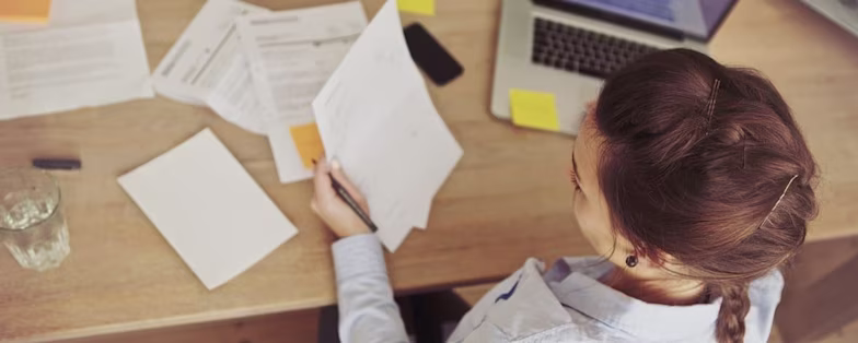 Woman checking paperwork