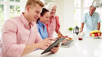 Woman on laptop with MoneySuperMarket logo displayed