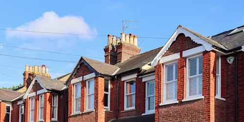 English houses with blue sky