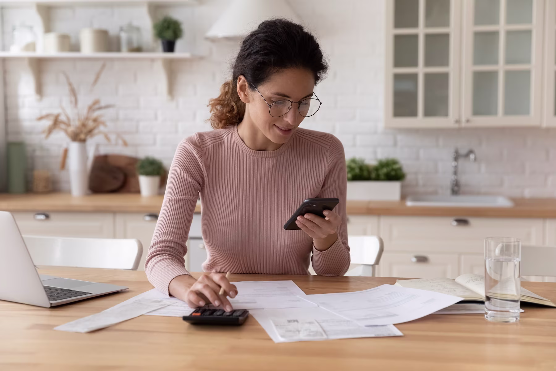 woman doing budgeting at home