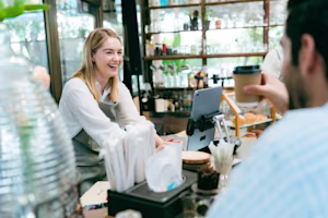 Woman on laptop with MoneySuperMarket logo displayed