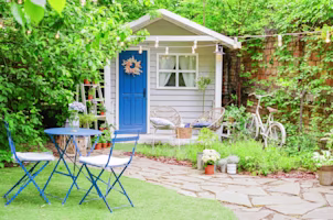 Woman on laptop with MoneySuperMarket logo displayed