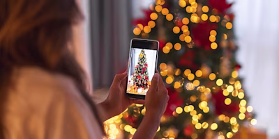 Woman on laptop with MoneySuperMarket logo displayed