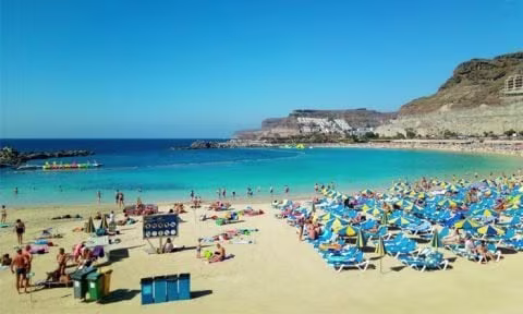 Sunbathers on a beach, Canary Islands