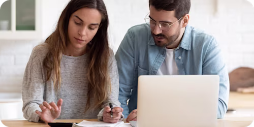 couple looking at finances