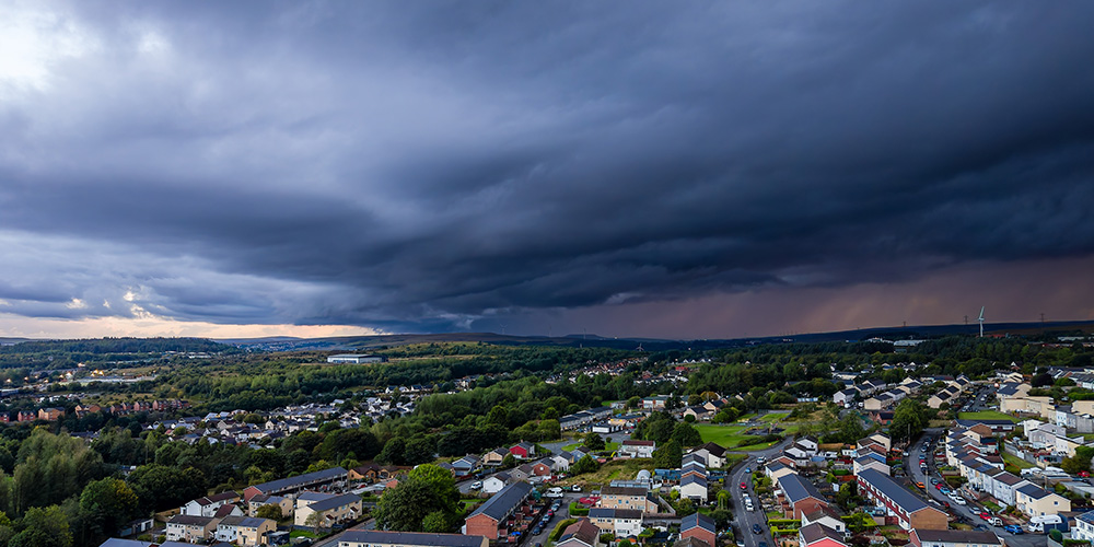 Storm clouds over a town in Wales