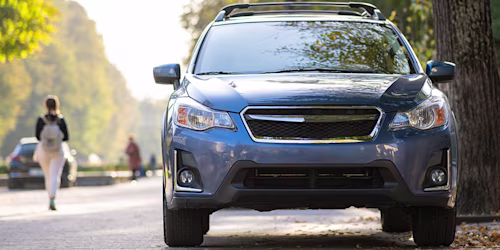 car parked on sunny road