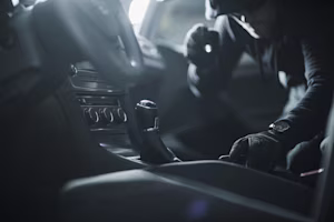 Woman on laptop with MoneySuperMarket logo displayed