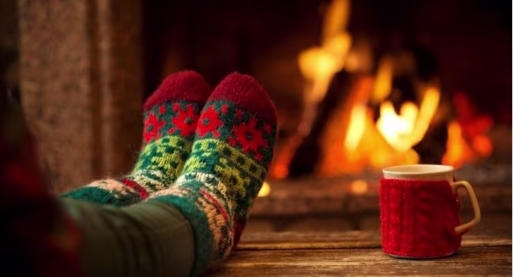 warm fire with woolly socks and hot drink
