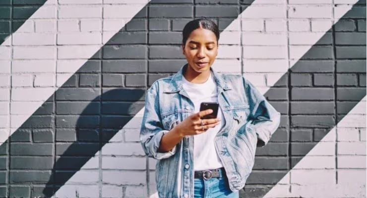 Young woman using her mobile