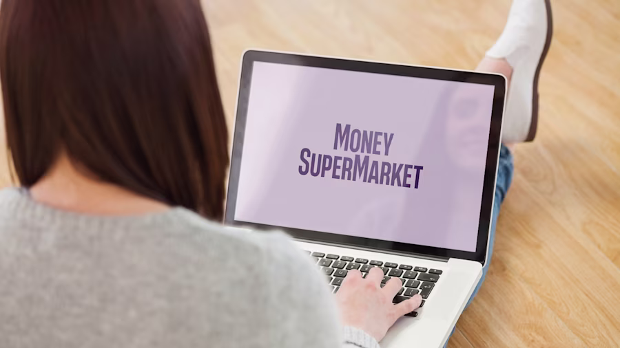 woman with laptop showing MoneySuperMarket on her lap