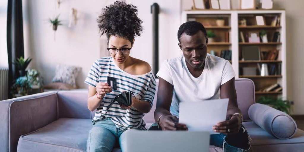 Couple looking at bills online