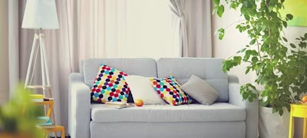 Woman on laptop with MoneySuperMarket logo displayed