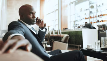 Man in suit on mobile phone