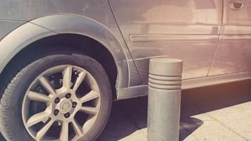 Woman on laptop with MoneySuperMarket logo displayed