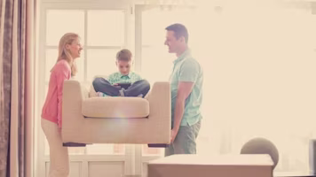 Woman on laptop with MoneySuperMarket logo displayed