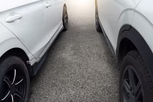 Woman on laptop with MoneySuperMarket logo displayed