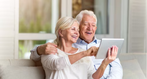 Smiling elderly couple