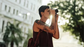 Person looking through binoculars