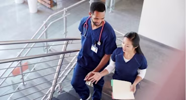 Woman on laptop with MoneySuperMarket logo displayed