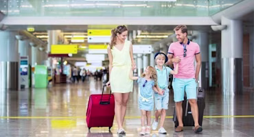 Woman on laptop with MoneySuperMarket logo displayed