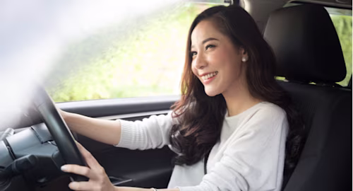 Woman driving car