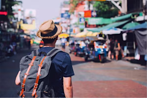 Woman on laptop with MoneySuperMarket logo displayed