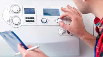 Woman on laptop with MoneySuperMarket logo displayed