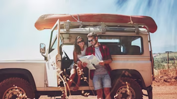 https://static.moneysupermarket.com/content/dam/moneysupermarket/news/couple-on-holiday-with-jeep.jpg