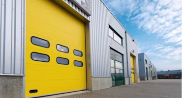 Woman on laptop with MoneySuperMarket logo displayed