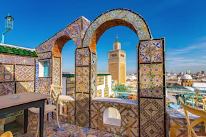 Woman on laptop with MoneySuperMarket logo displayed