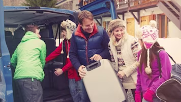 Woman on laptop with MoneySuperMarket logo displayed